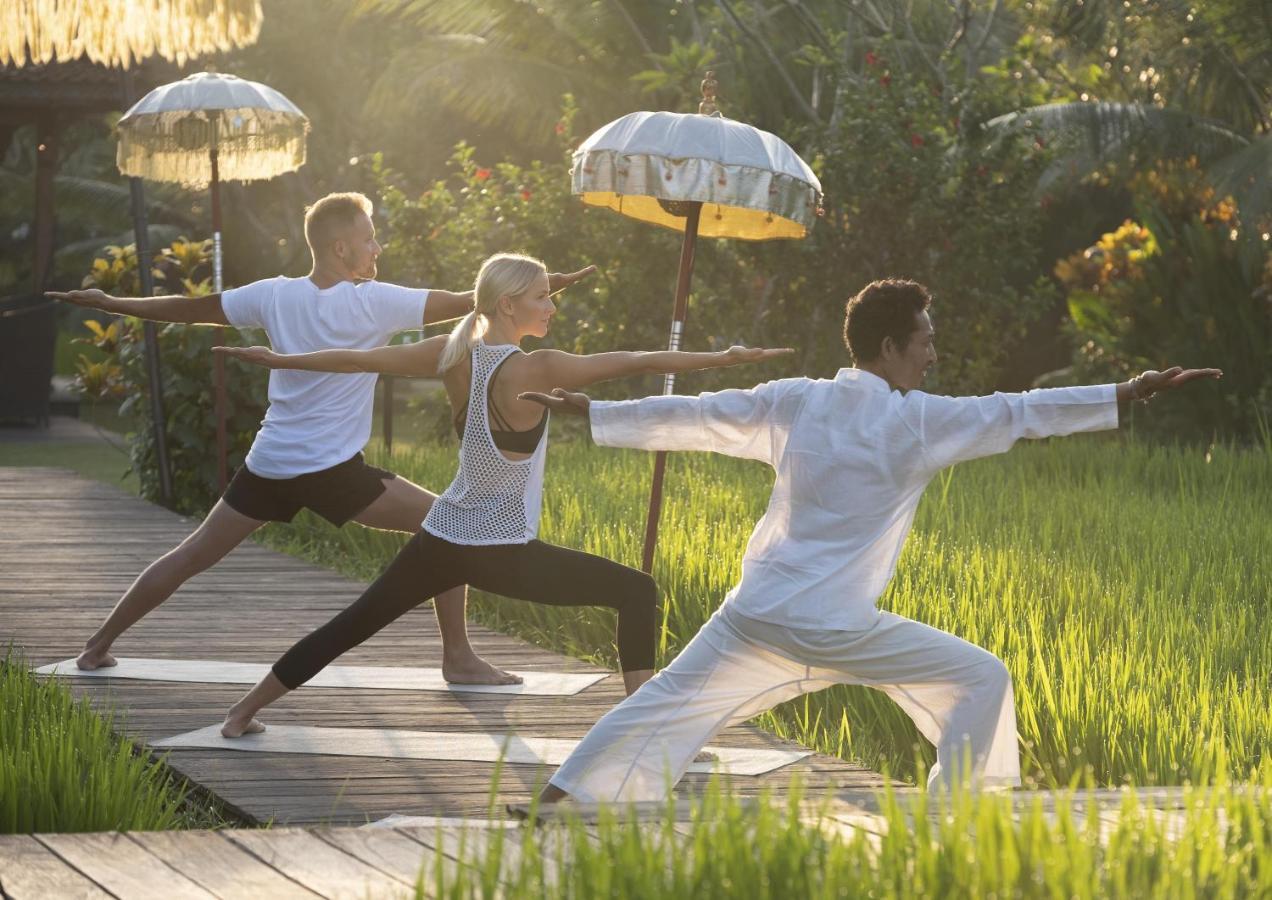 Alaya Resort Ubud Exterior foto A yoga class at Four Seasons Resort, Bali